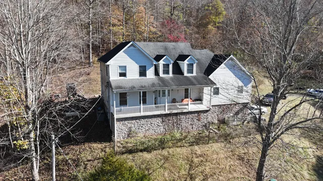 a house with trees in front of it