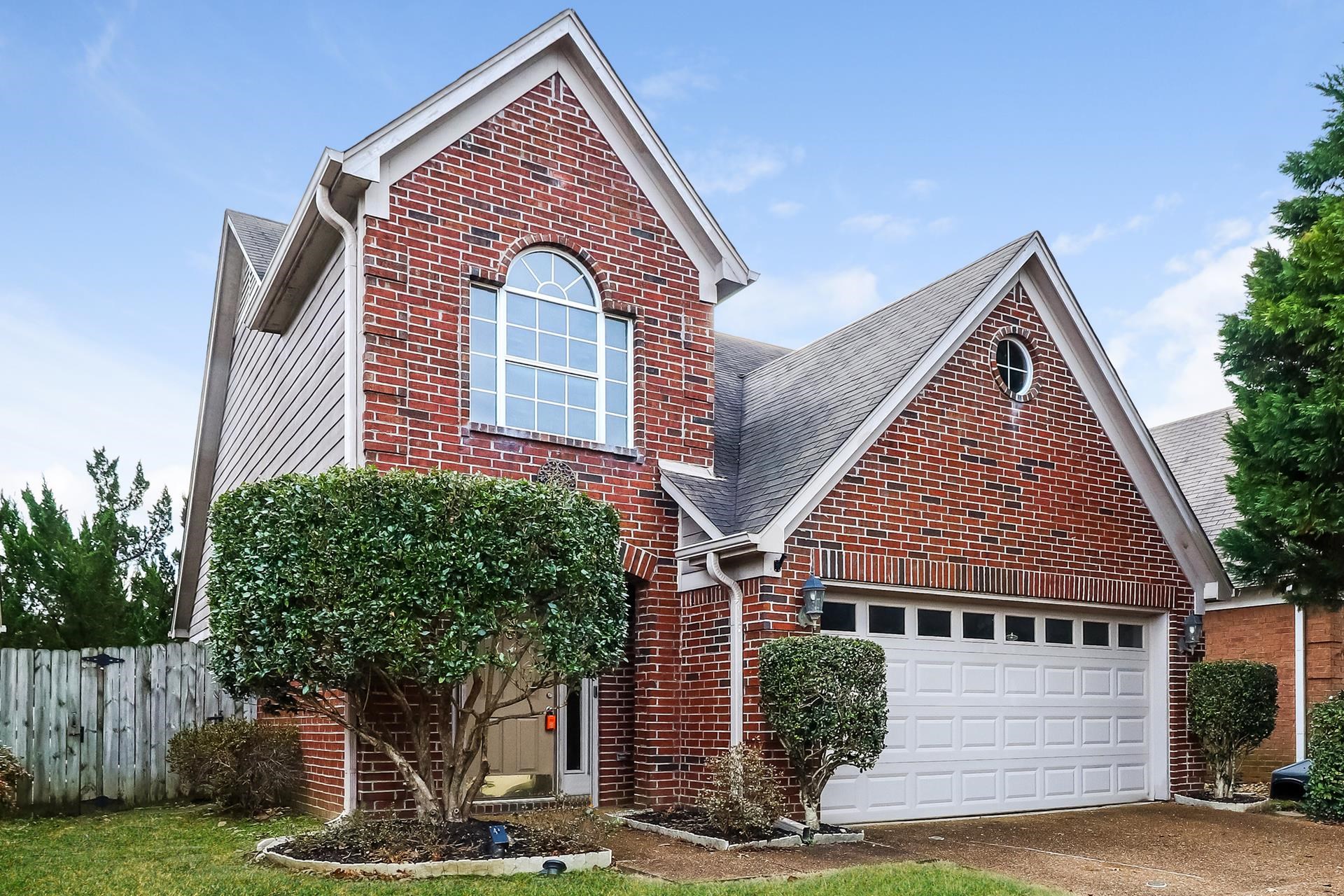 10097 Cross Ridge Road Cordova, TN 38018 - Photo 2 of 17 a view of a house with a yard