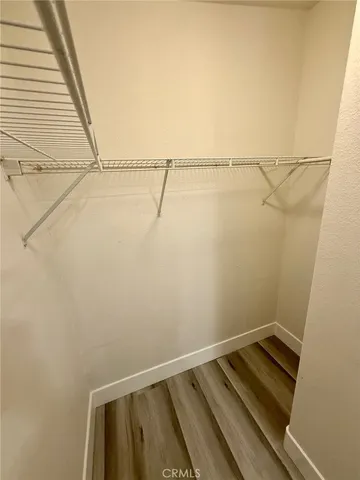 a view of small space with racks on the wall