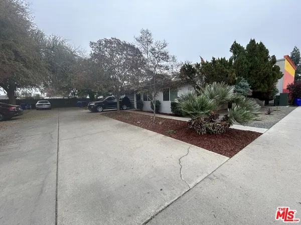 a view of a street with houses