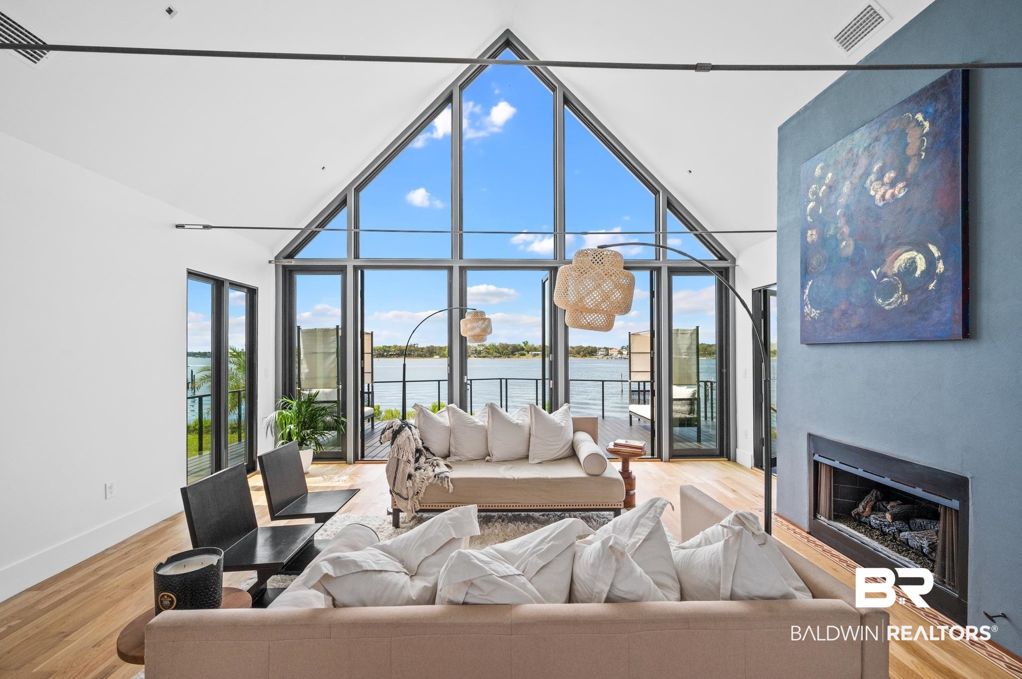 33349 River Road Orange Beach, AL 36561 - Photo 29 of 61 Vaulted ceiling with expansive waterside glass wall