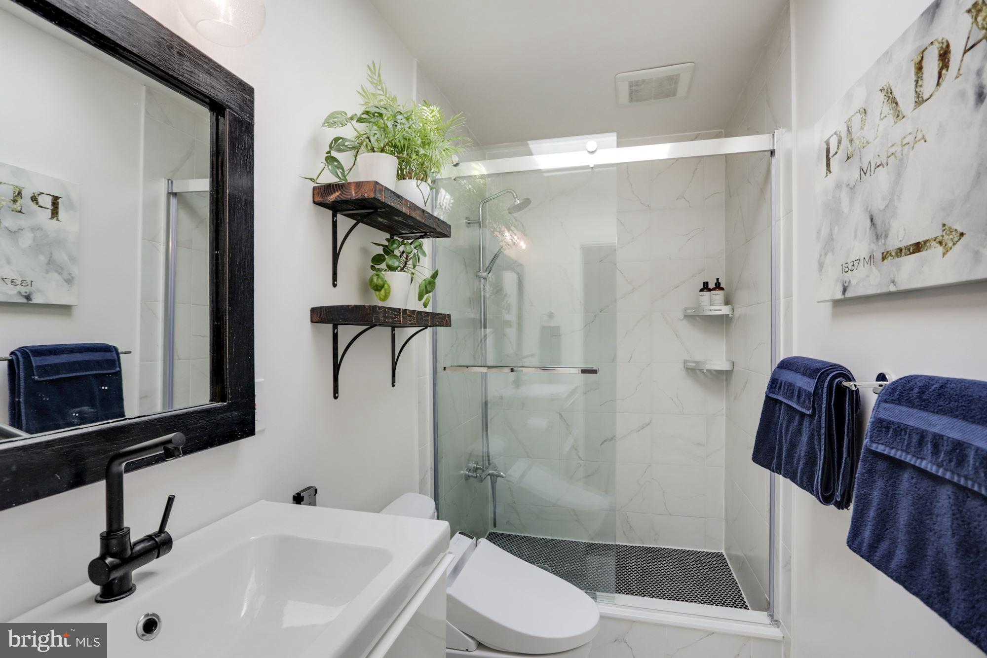 554 23rd Place Northeast Washington, DC 20002 - Photo 16 of 26 Hall bath is bright and renovated