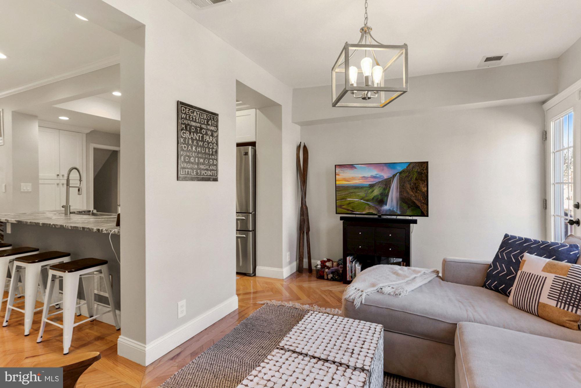 554 23rd Place Northeast Washington, DC 20002 - Photo 6 of 26 Open yet distinct living spaces
