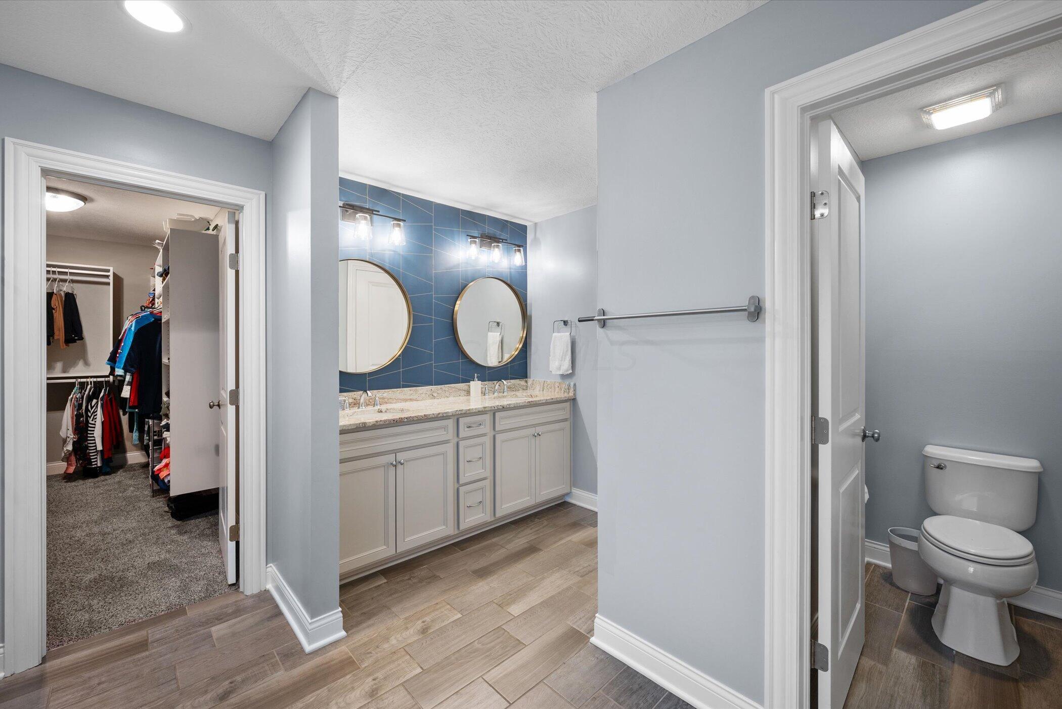 706 Bigham Ridge Boulevard Westerville, OH 43081 - Photo 33 of 62 Ensuite bath - double sink vanity, water closet, soaking tub, shower and large WIC