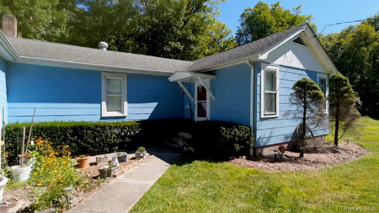 210 Basel Road Pine Bush, NY 12566 - Photo 1 of 1 Ranch-style house with a front yard and roof with shingles