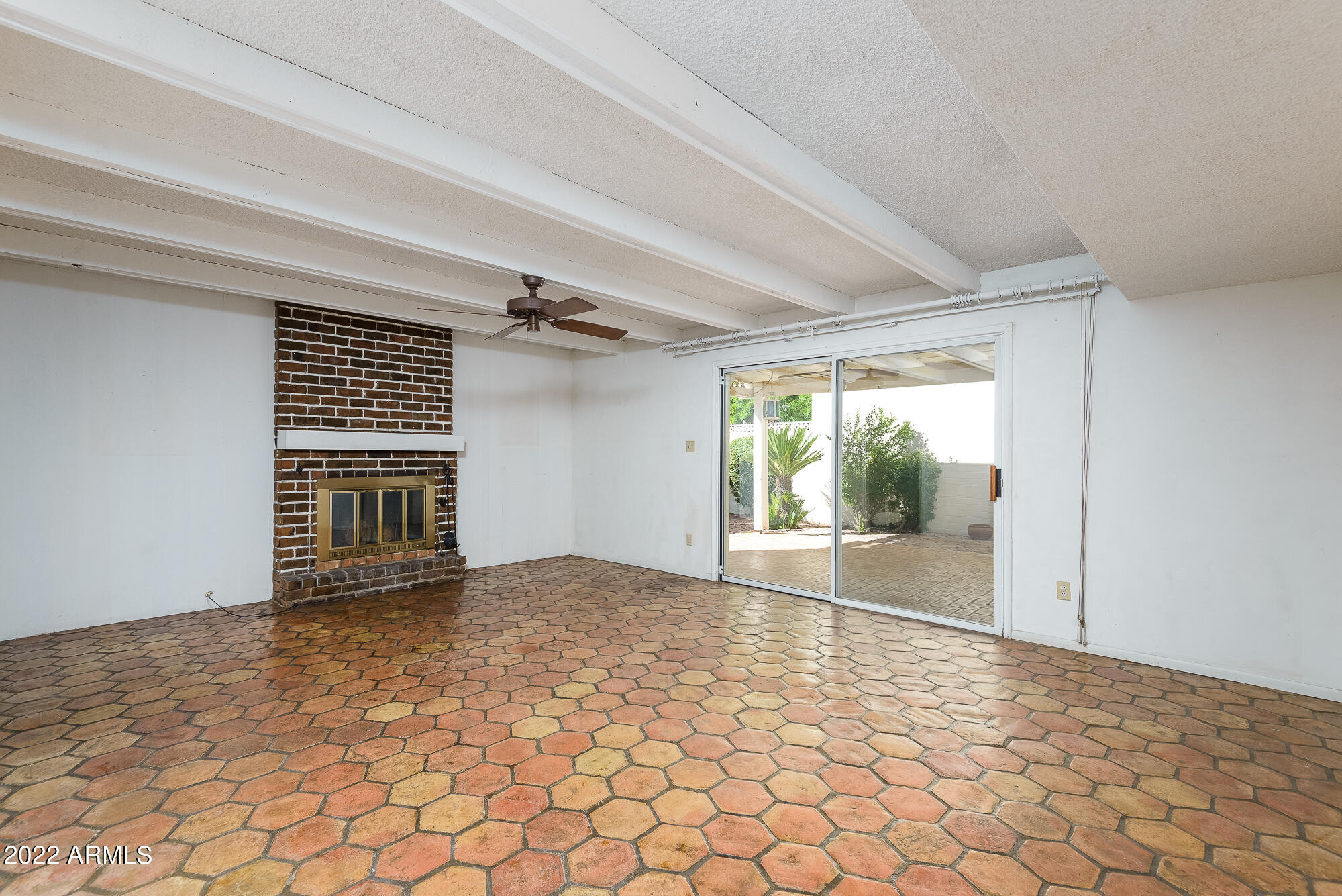 6016 North 10th Way Phoenix, AZ 85014 - Photo 11 of 28 Cozy fireplace in family room