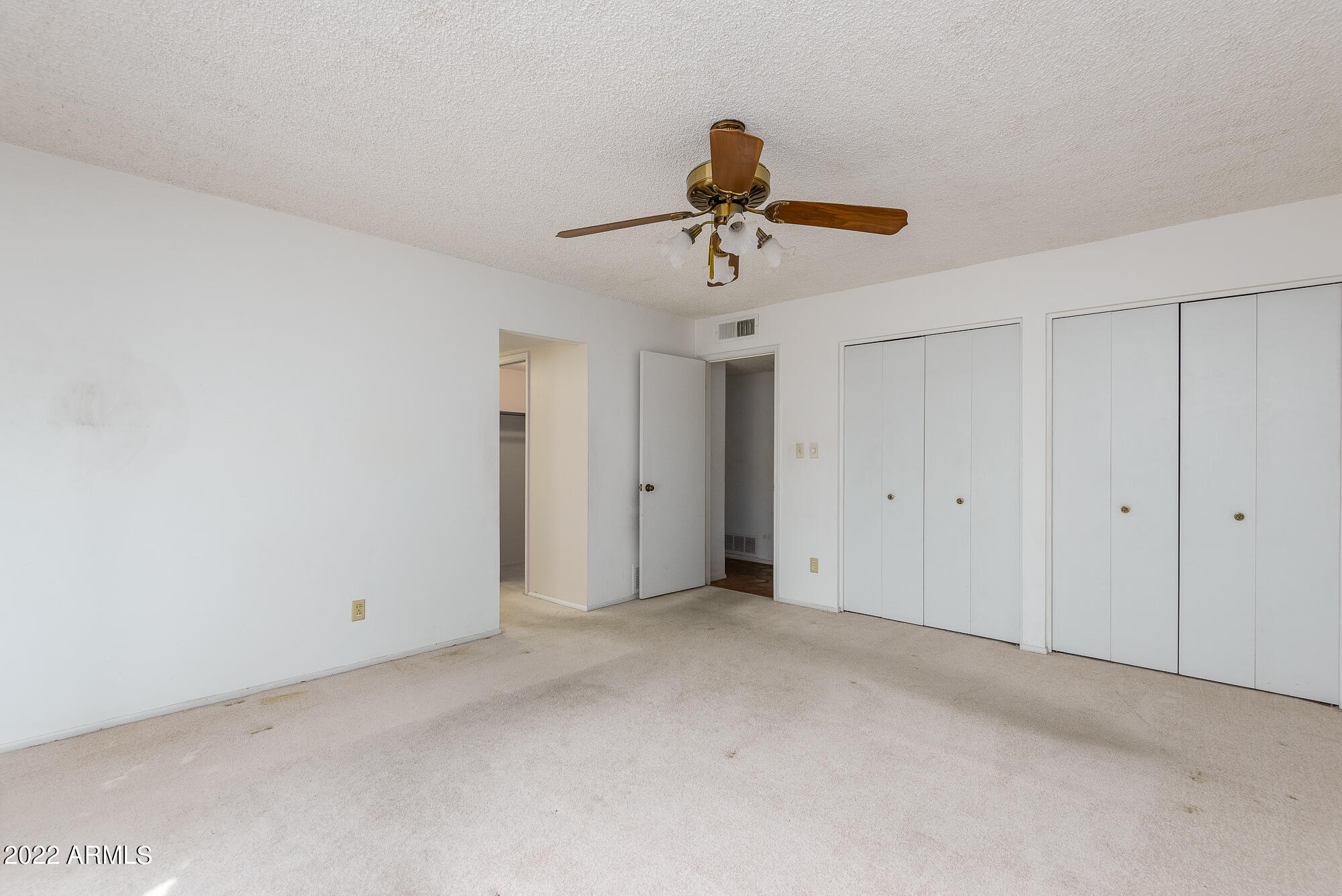 6016 North 10th Way Phoenix, AZ 85014 - Photo 19 of 28 Primary bedroom with LOTS of closets