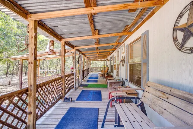 a view of swimming pool with seating area
