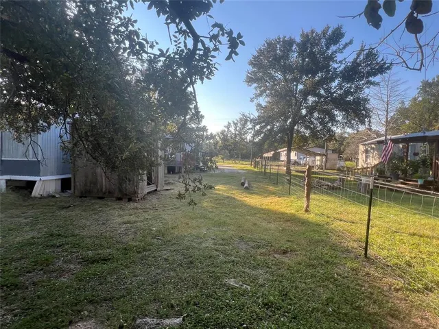 a fire hydrant in the middle of a field
