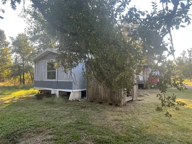 a view of a balcony with an outdoor space
