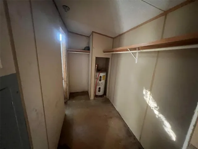 a bathroom with a toilet sink and a shower