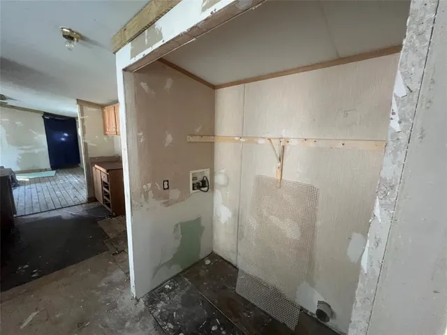 a view of utility room with windows