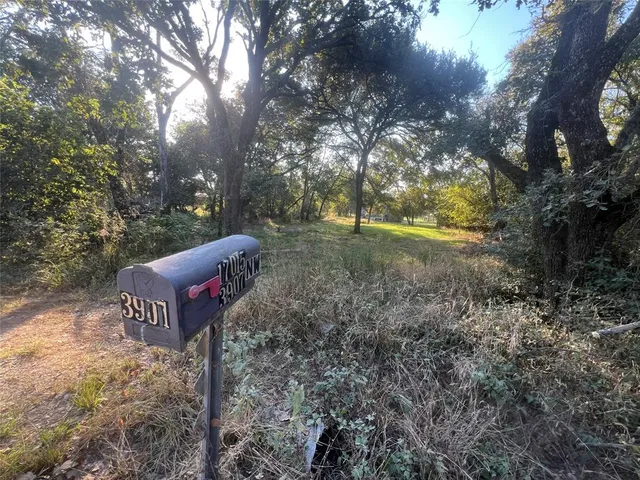 a view of swimming pool with a yard