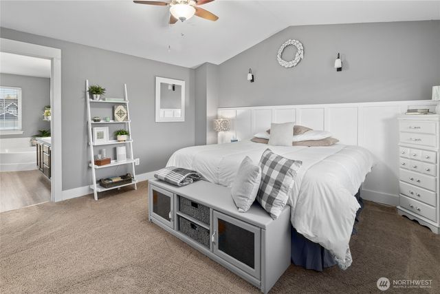 a bedroom with a bed and a cabinets