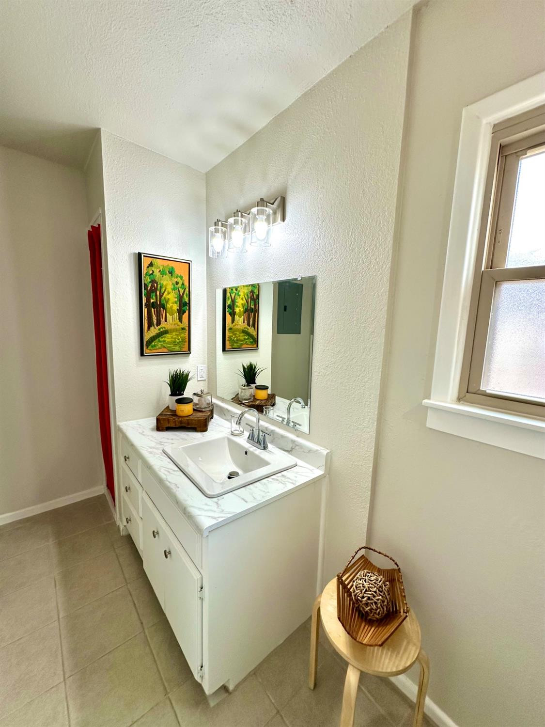 101 15th Street Levelland, TX 79336 - Photo 29 of 29 a view of kitchen island with sink dining table and chairs