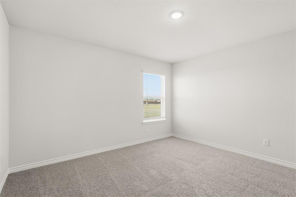 10612 Brocket Lane Crowley, TX 76036 - Photo 11 of 35 a view of an empty room with a window