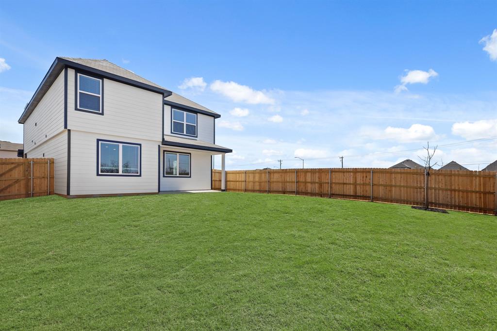 10612 Brocket Lane Crowley, TX 76036 - Photo 18 of 35 a view of a backyard of the house