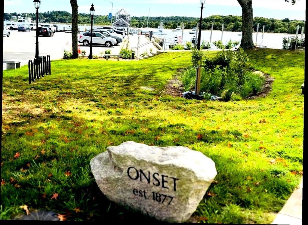 36 C Starboard Road, Unit 36C Wareham, MA 02532 - Photo 5 of 8 a view of a swimming pool with an outdoor seating