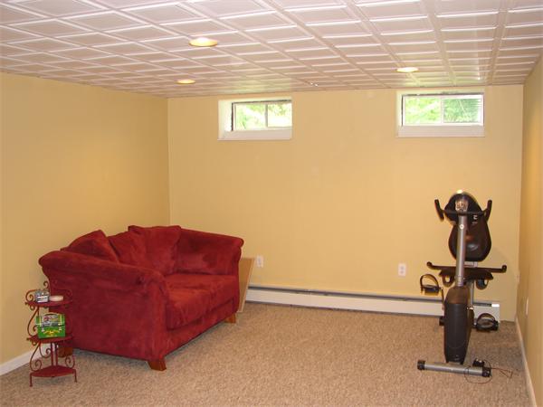 108 Fitch Road Lancaster, MA 01523 - Photo 12 of 20 a view of a room with gym equipment