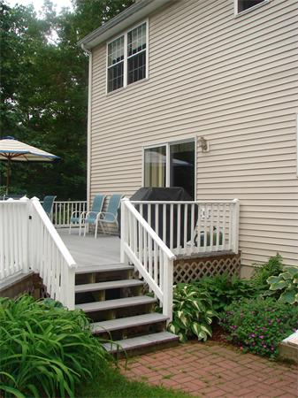 108 Fitch Road Lancaster, MA 01523 - Photo 16 of 20 a view of a house with backyard and deck