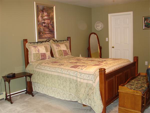 108 Fitch Road Lancaster, MA 01523 - Photo 8 of 20 a bedroom with bed and a window