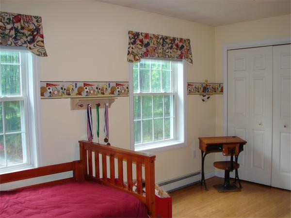 108 Fitch Road Lancaster, MA 01523 - Photo 10 of 20 a bedroom with furniture and a window