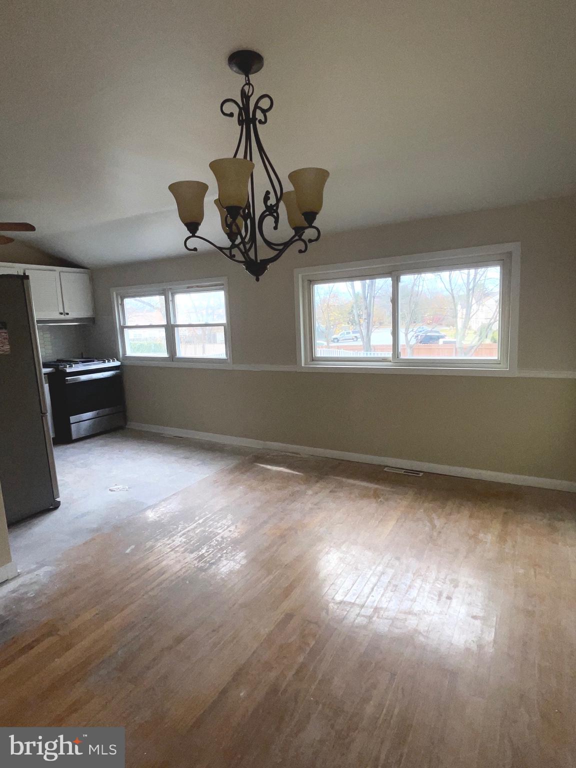 292 Justice Drive Carneys Point, NJ 08069 - Photo 5 of 17 a view of empty room with windows