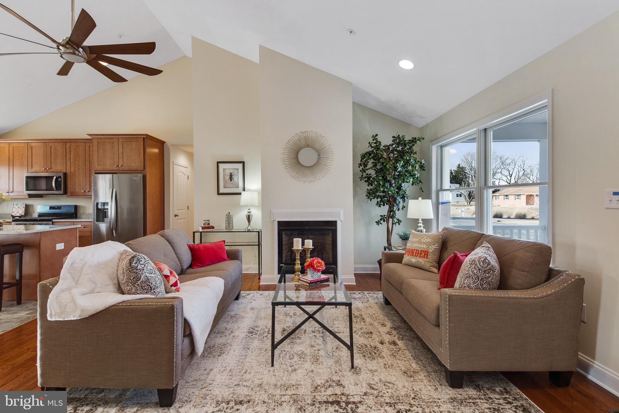 Great Room with Gas Fire Place, Hard wood Floors.