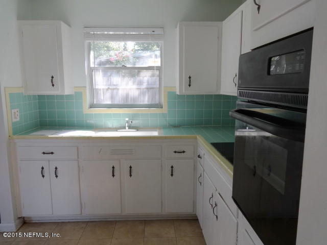7462 Stonehurst Road South Jacksonville, FL 32277 - Photo 9 of 17 M - 59 - Kitchen from Living Room