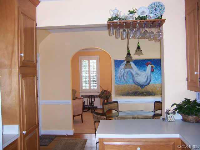 7200 River Road Richmond, VA 23229 - Photo 7 of 10 a living room with furniture and a painting on the wall