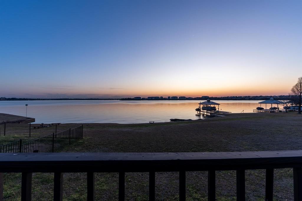 2109 Windjammer Way Rowlett, TX 75088 - Photo 1 of 21 Water view with boat lift and a boat dock