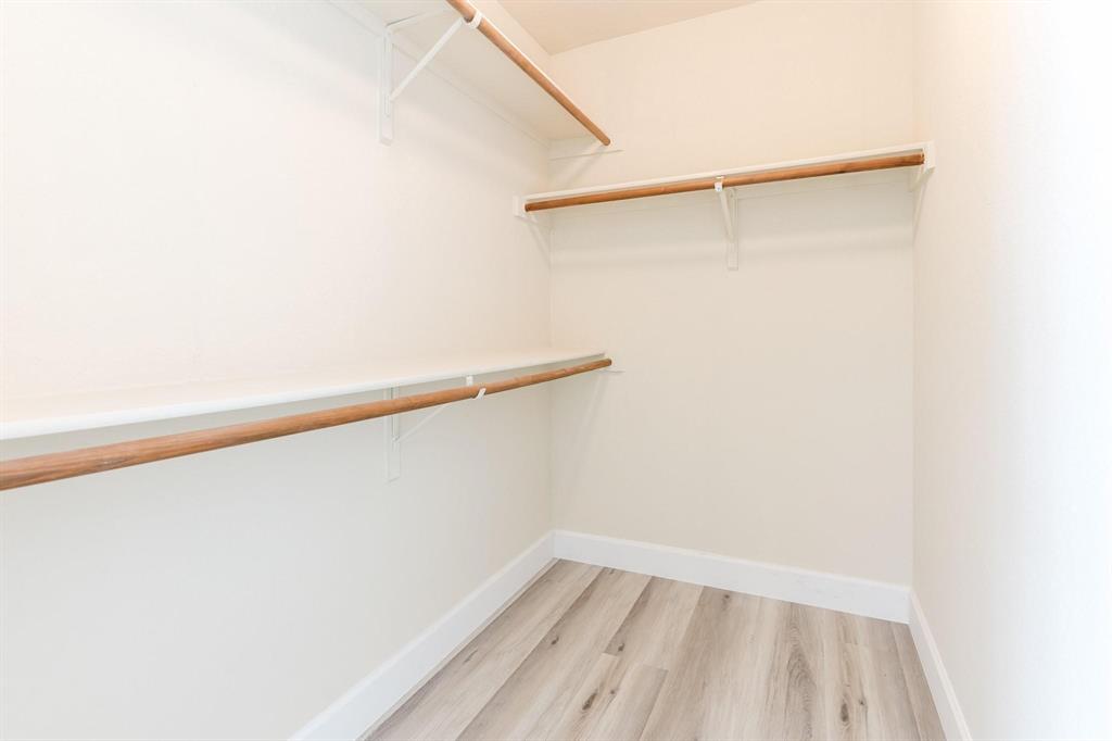 2109 Windjammer Way Rowlett, TX 75088 - Photo 11 of 21 Spacious closet featuring light wood-style floors