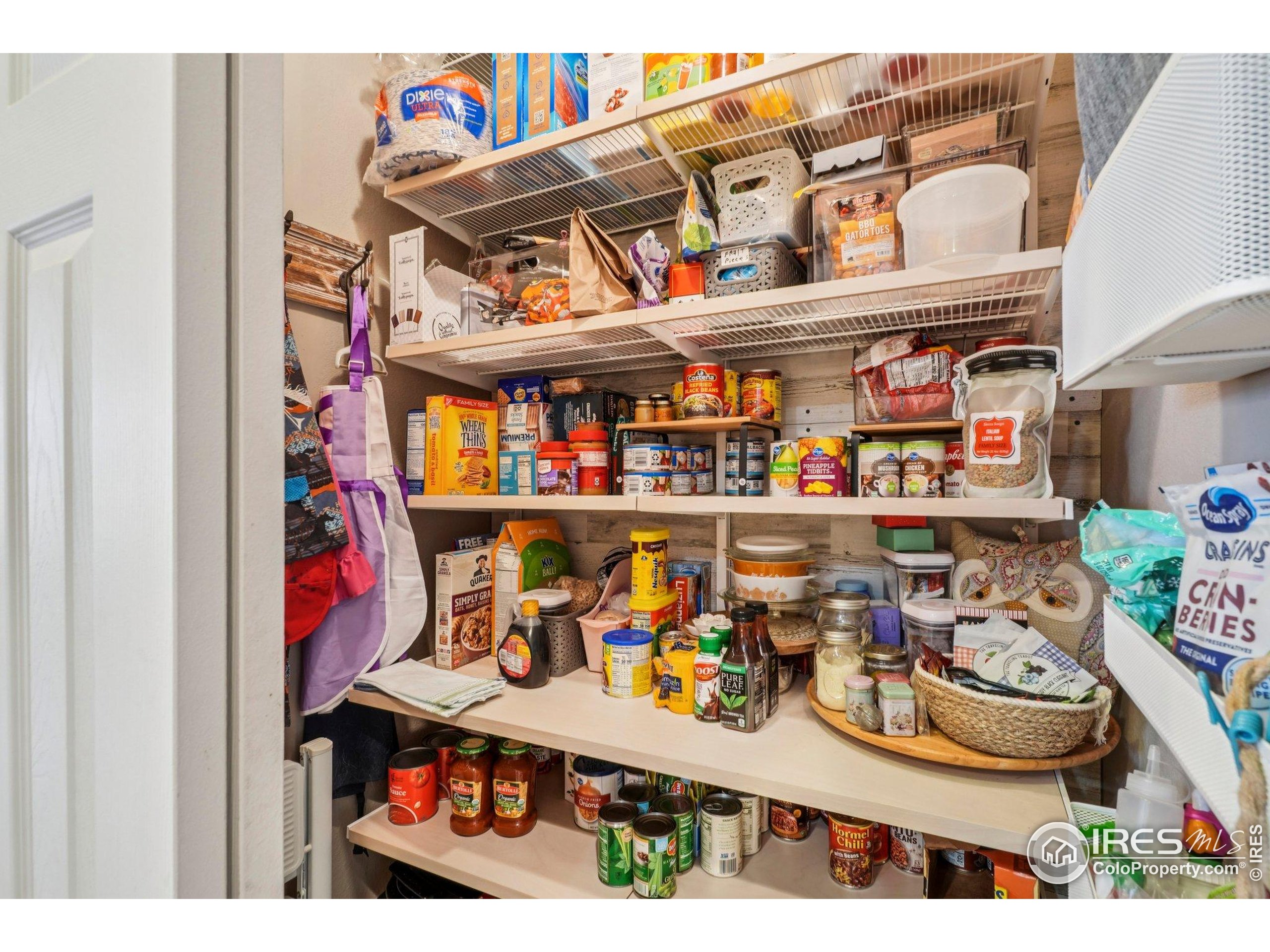 256 Homestead Way Brighton, CO 80601 - Photo 8 of 42 a view of storage and utility room