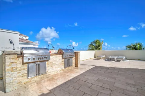 a view of an ocean and a yard