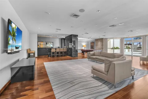 a room with furniture and a potted plant