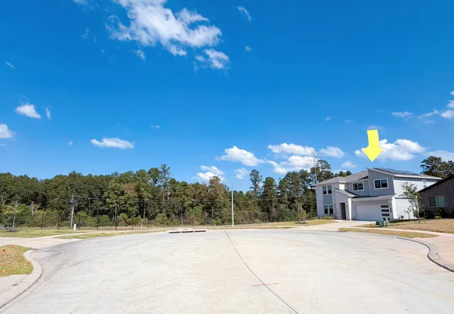 a view of lake with green space