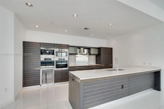 a room with a sink and a window