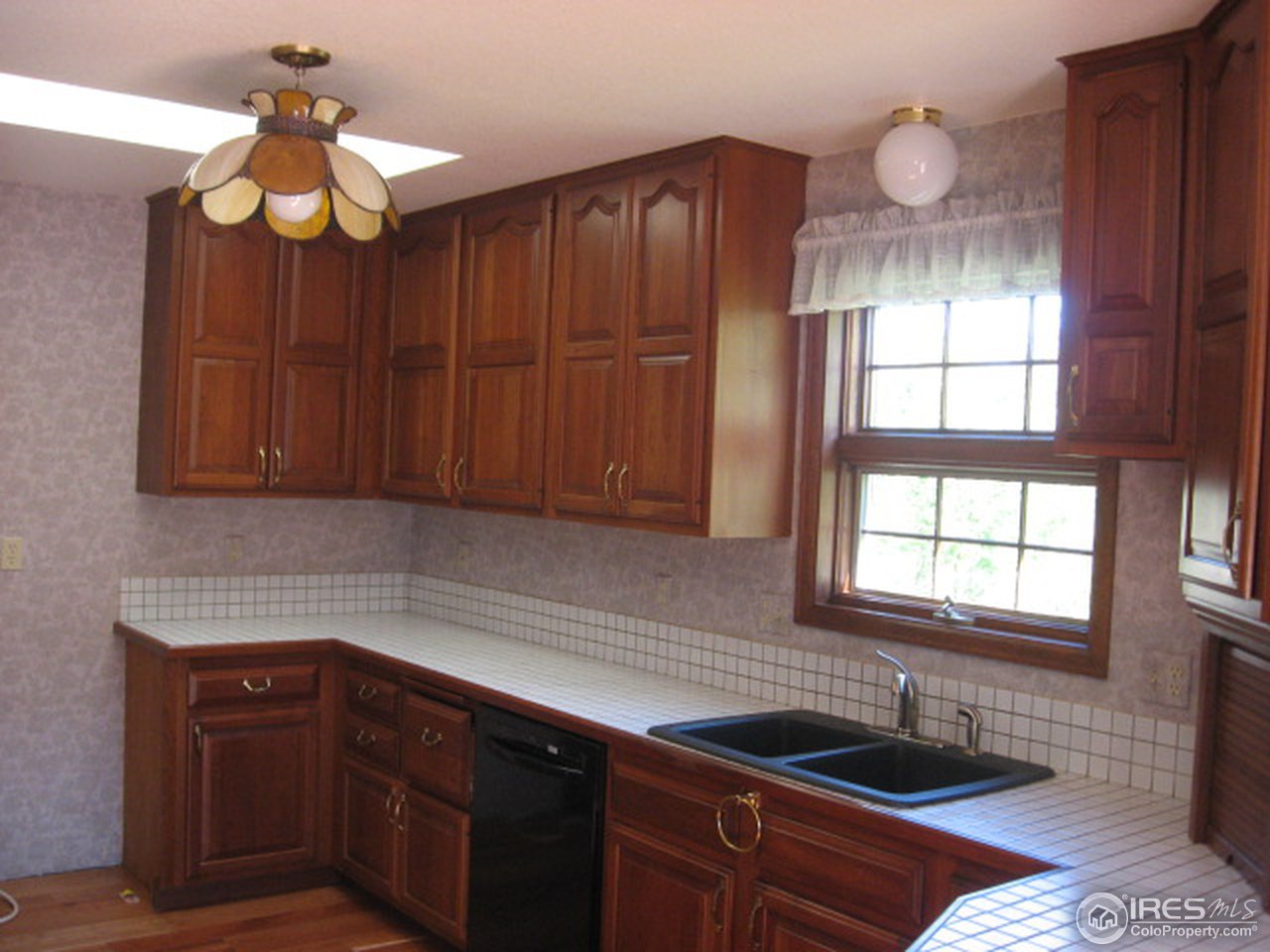 641 Bonner Springs Ranch Road Laporte, CO 80535 - Photo 8 of 24 Cherry cabinets