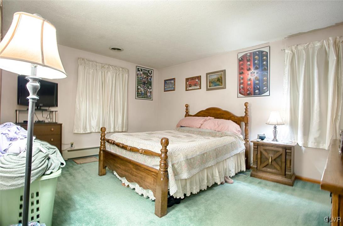 561 Clearfield Road Nazareth, PA 18064 - Photo 10 of 23 a bedroom with a bed and a window