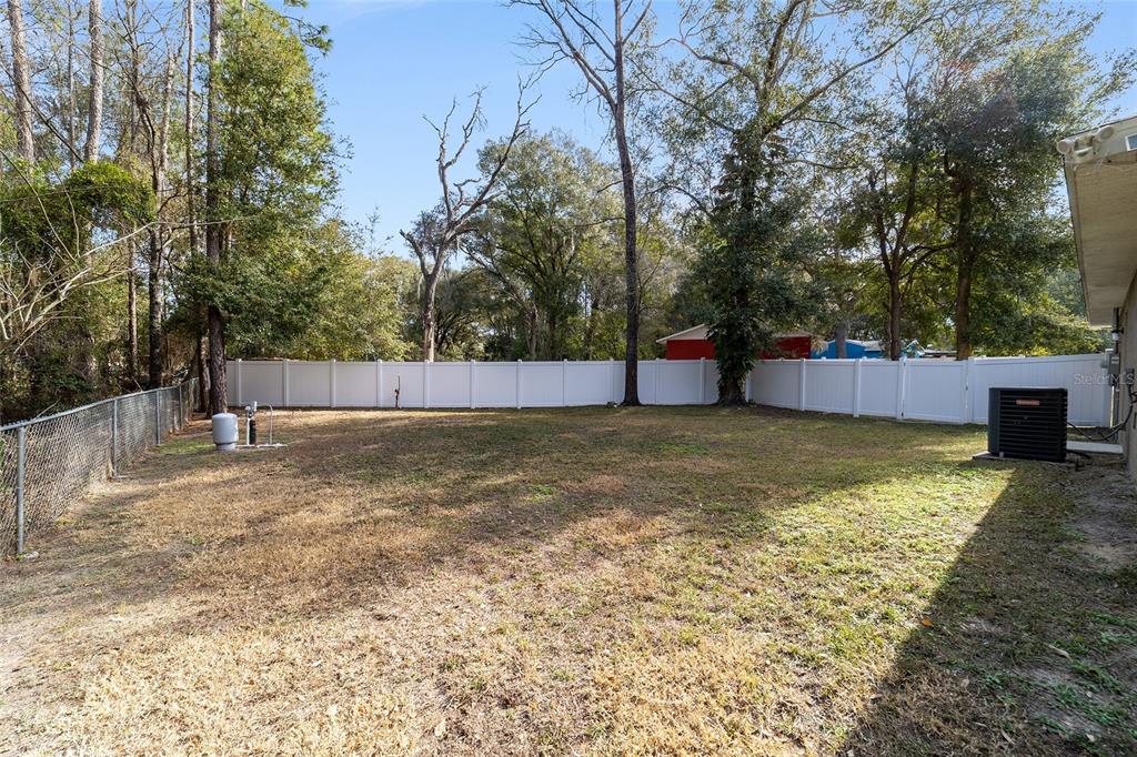 38 Cedar Tree Terrace Ocala, FL 34472 - Photo 16 of 18 a view of a backyard