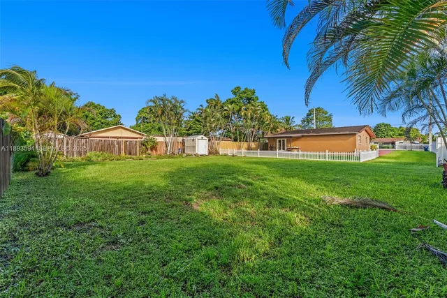 a house view with a garden space