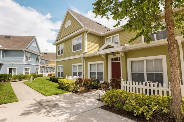front view of a house with a small yard