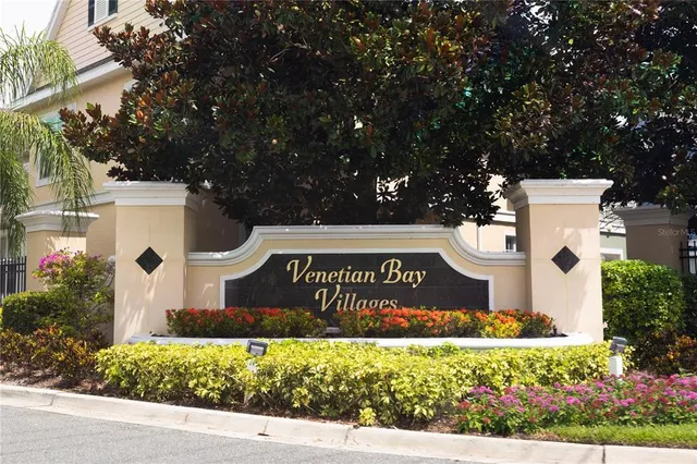 a view of a patio with table and chairs potted plants and palm tree