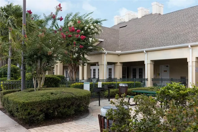 a view of a deck with wooden floor and city view