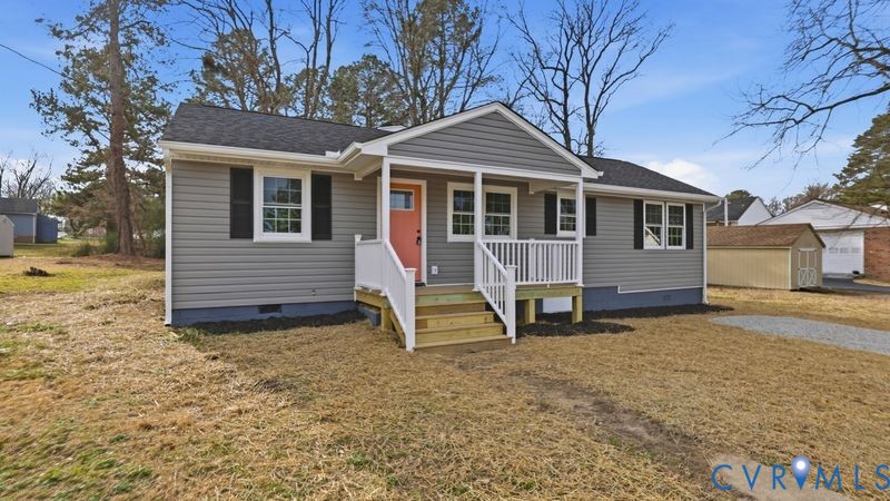 25209 Ritchie Avenue Petersburg, VA 23803 - Photo 41 of 50 a view of a house with a yard