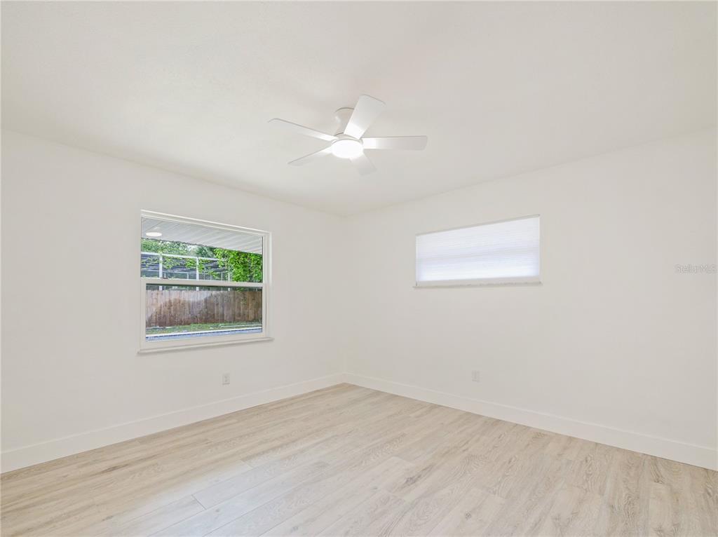 2466 Fieldingwood Road Maitland, FL 32751 - Photo 15 of 29 an empty room with a window and a fan