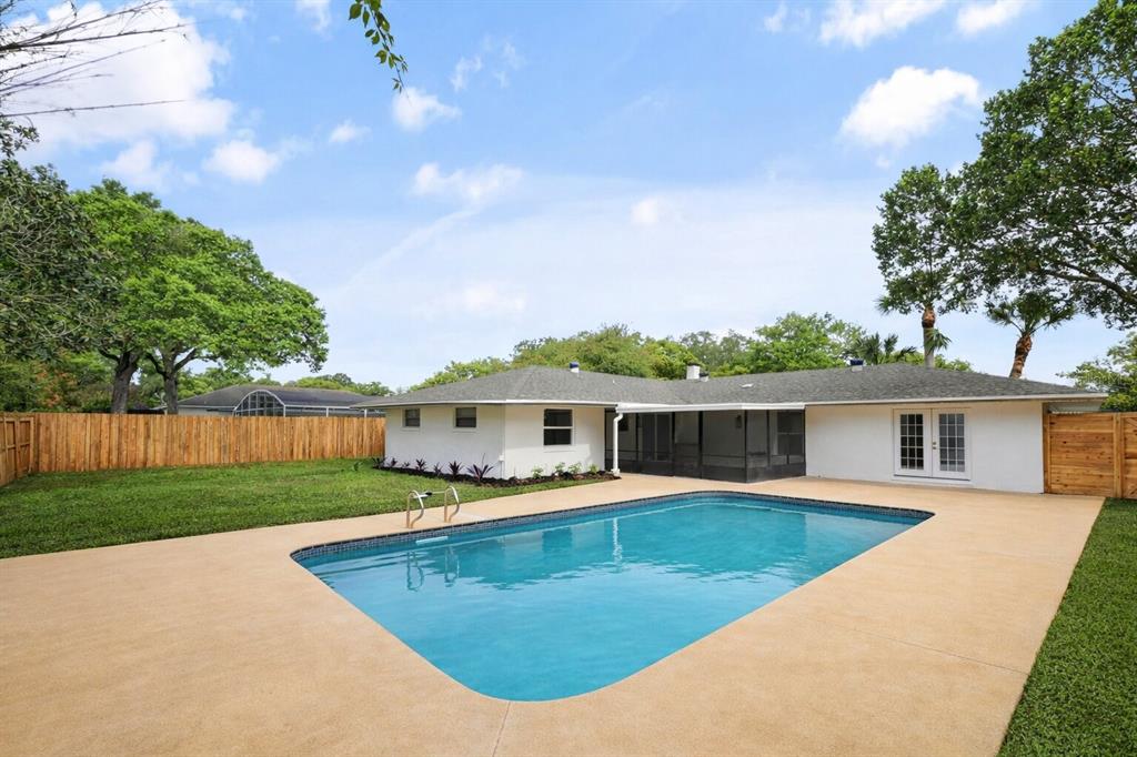 2466 Fieldingwood Road Maitland, FL 32751 - Photo 26 of 29 a view of a house with pool and a yard