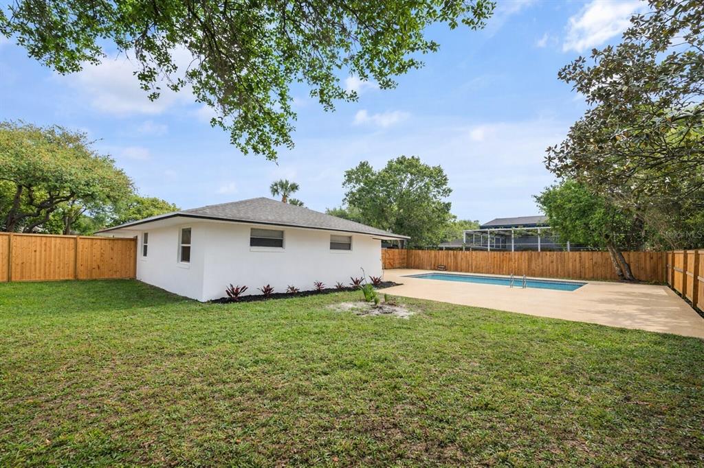 2466 Fieldingwood Road Maitland, FL 32751 - Photo 27 of 29 a front view of a house with a yard and trees