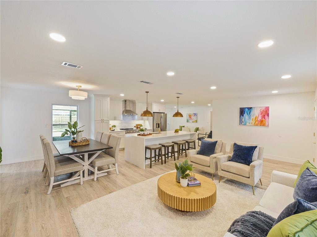 2466 Fieldingwood Road Maitland, FL 32751 - Photo 4 of 29 a living room with furniture and a table