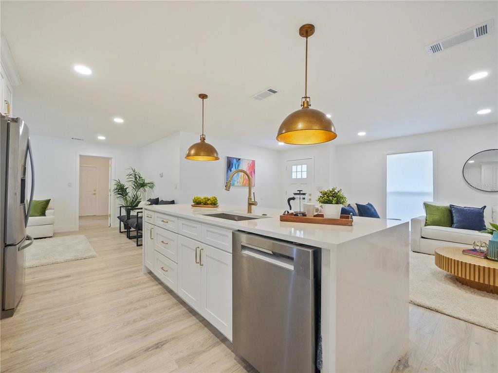 2466 Fieldingwood Road Maitland, FL 32751 - Photo 7 of 29 a kitchen with stove and cabinets
